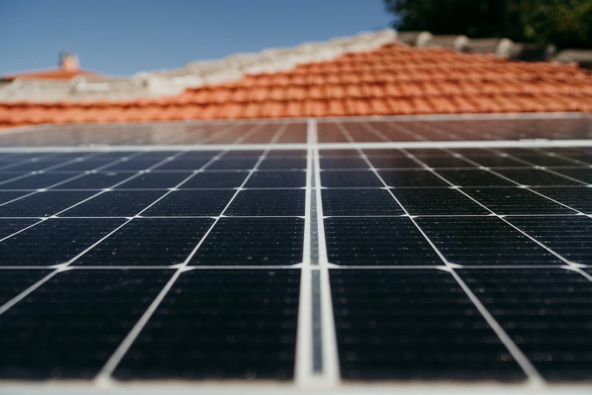 solar panels on roof during sunrise.Renewable energies and green energy concept